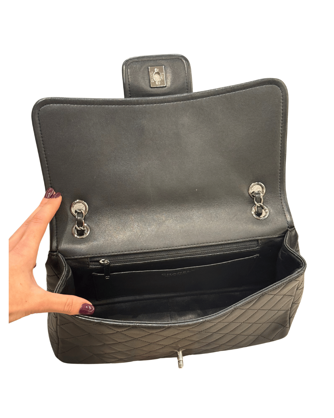 CHANEL FLAP IN PELLE TRAPUNTATA NERA