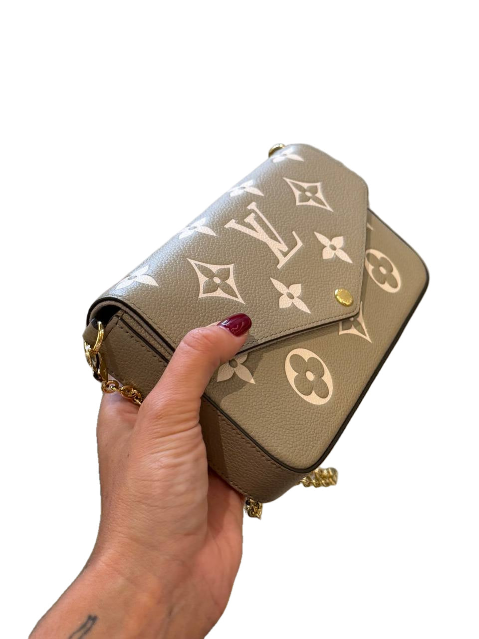 POCHETTE FÉLICIE LOUIS VUITTON TORTORA PELLE EMPREINTE