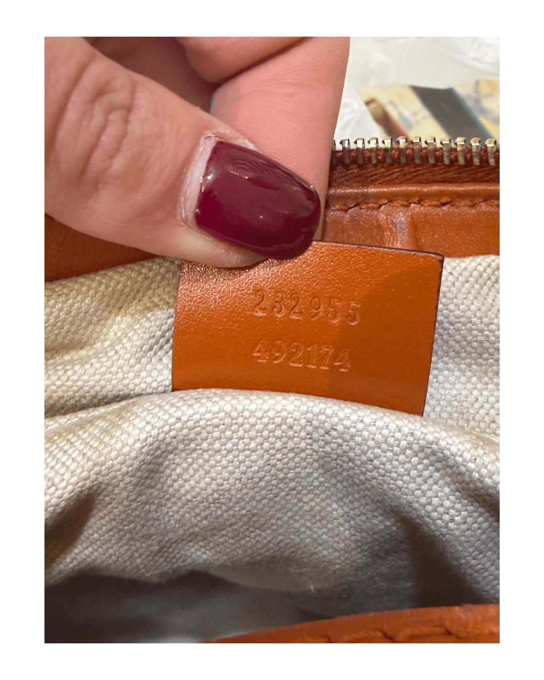 BORSA DI GUCCI GG SUPREME CON RIFINITURE ARANCIONI