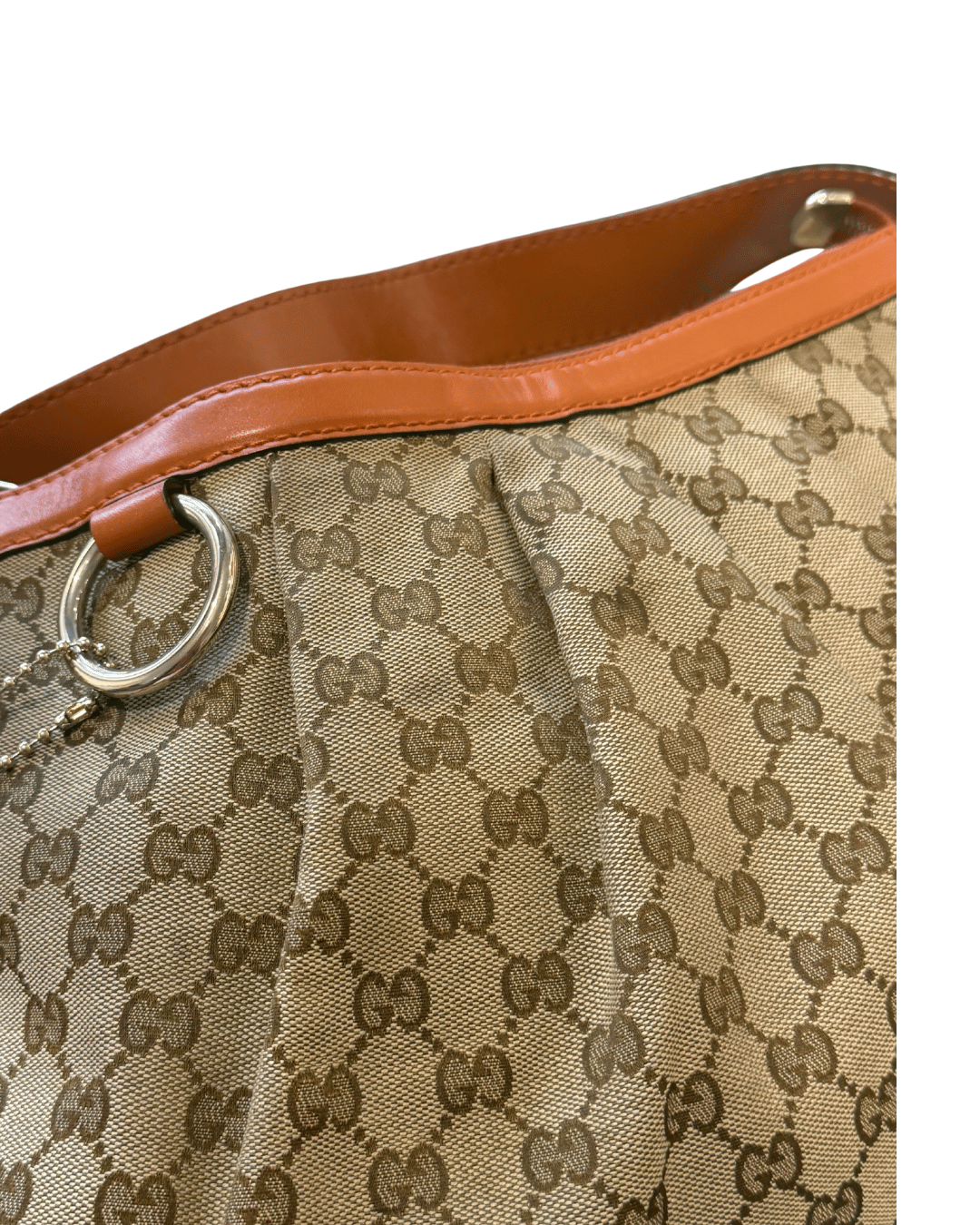 BORSA DI GUCCI GG SUPREME CON RIFINITURE ARANCIONI