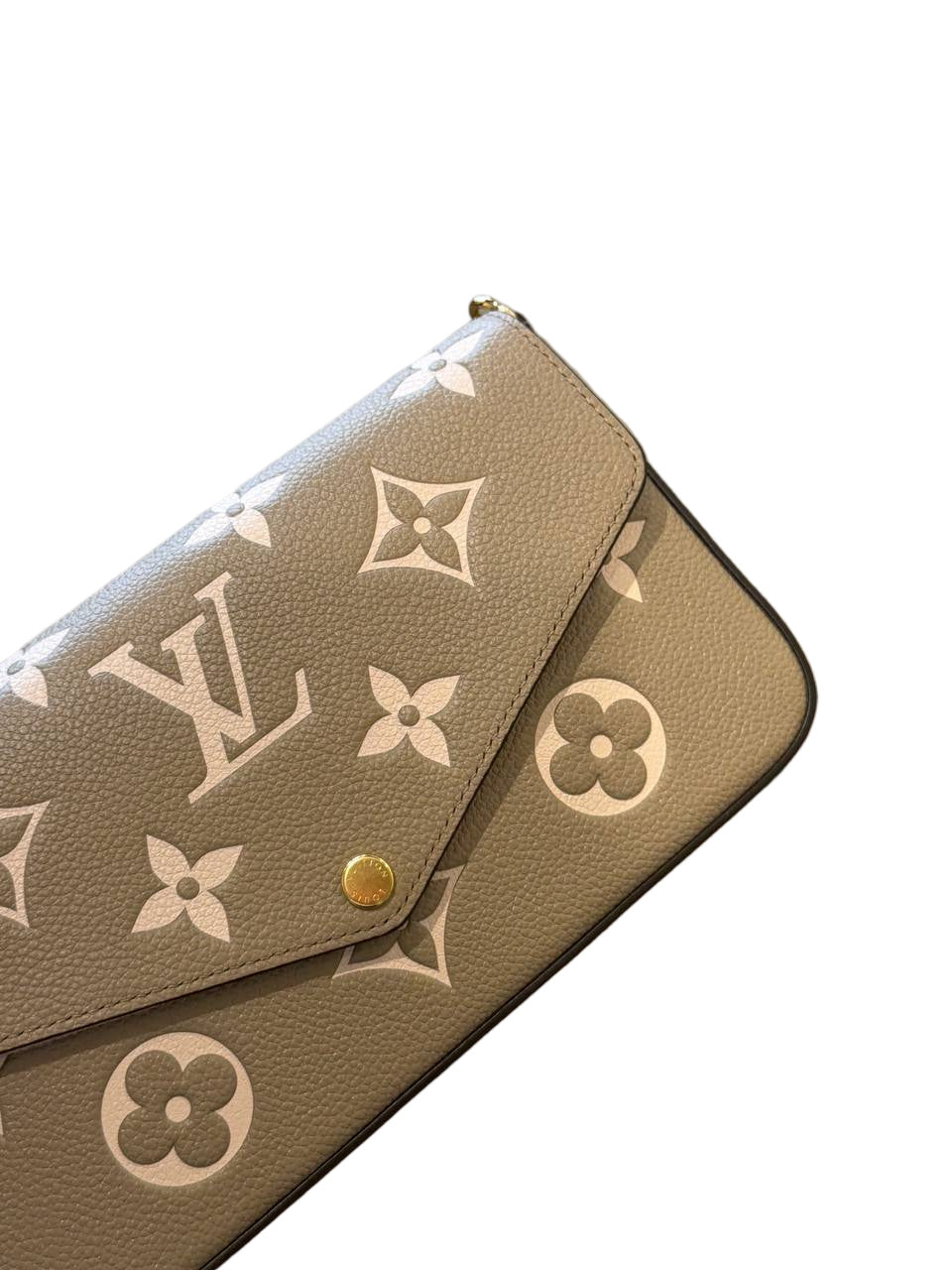 POCHETTE FÉLICIE LOUIS VUITTON TORTORA PELLE EMPREINTE